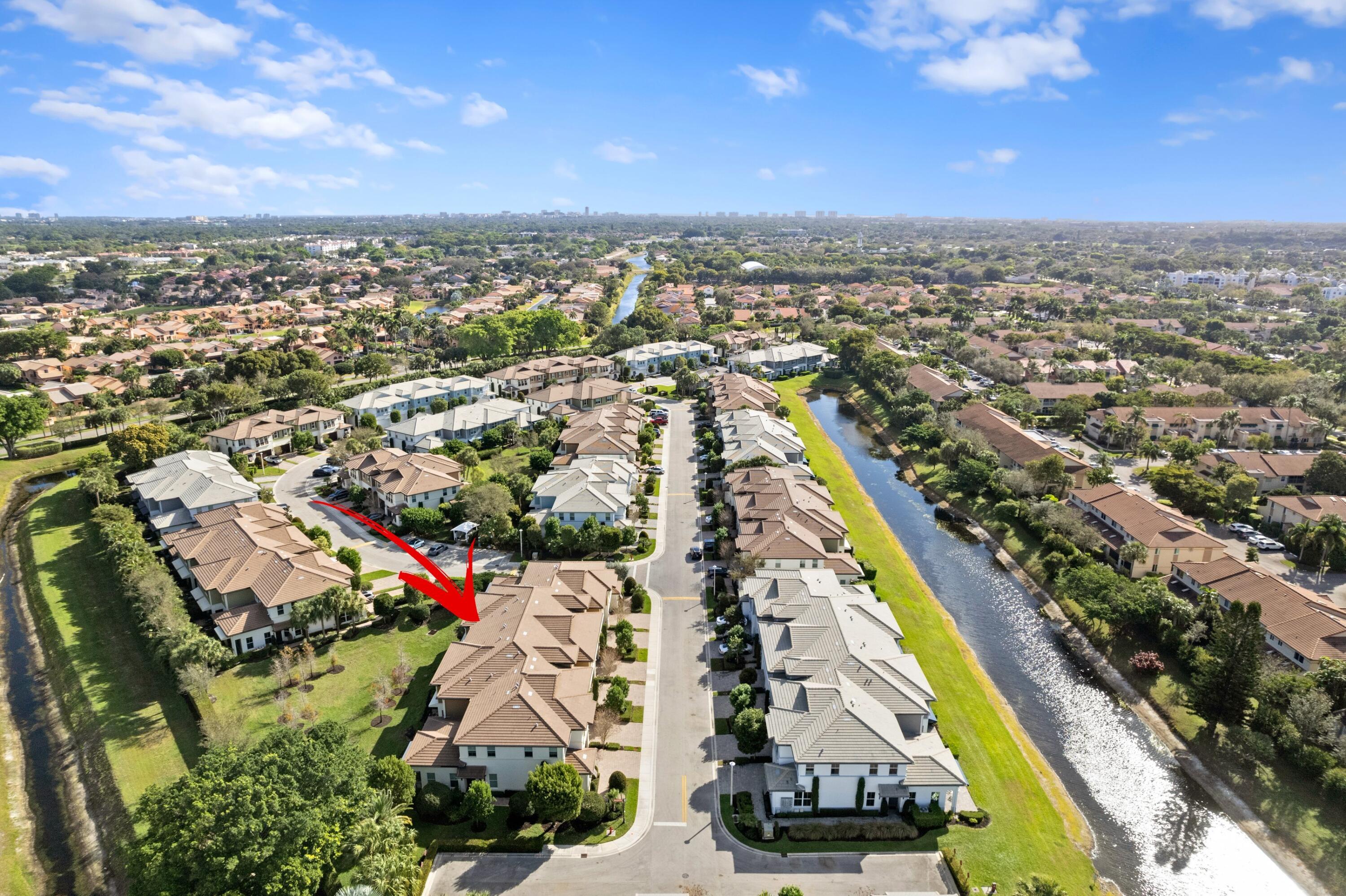 6693 Quiet Wave Trail, Unit 41 Boca Raton, FL 33433 - Photo 23 of 40 an aerial view of a city
