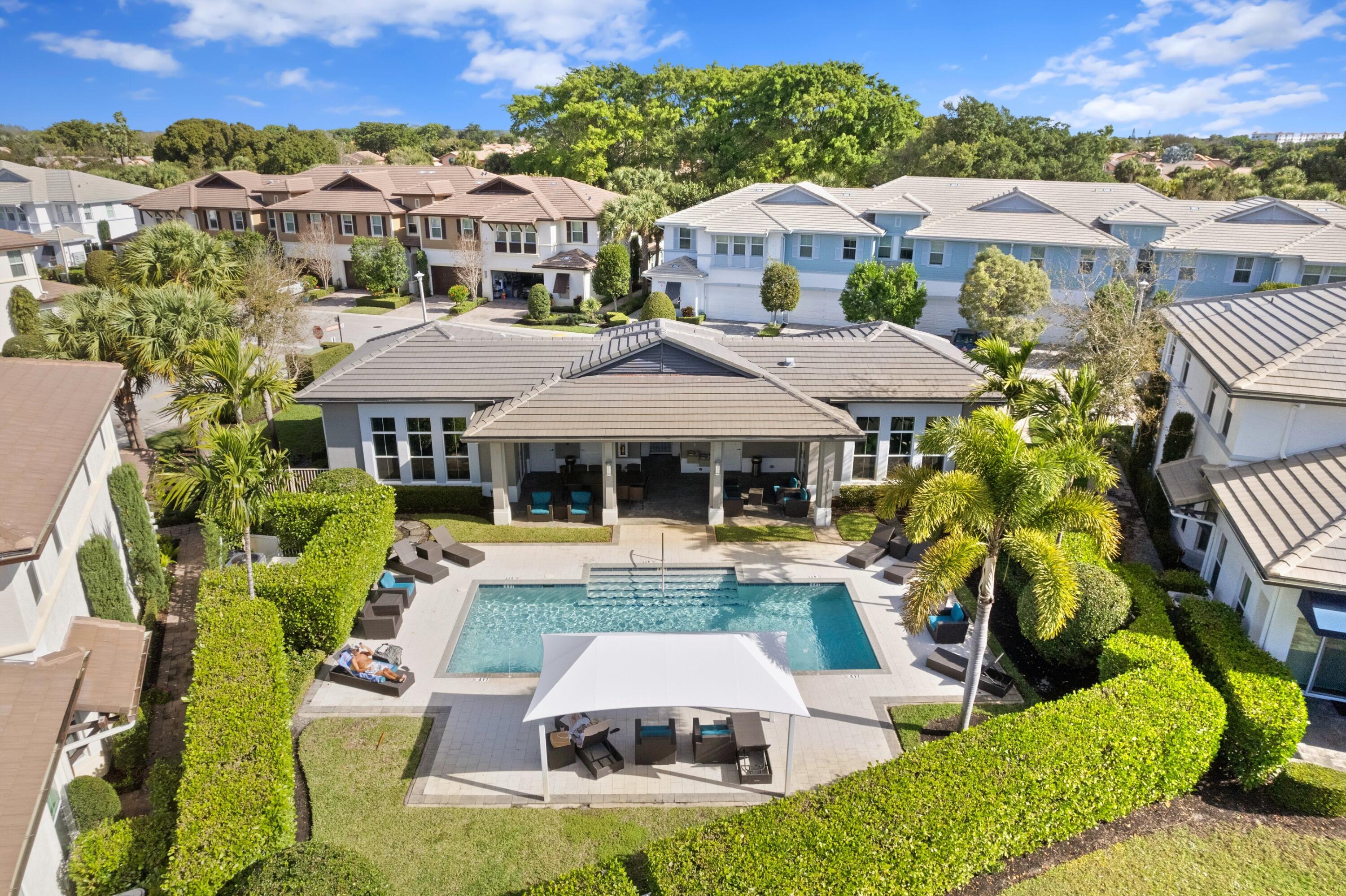 6693 Quiet Wave Trail, Unit 41 Boca Raton, FL 33433 - Photo 26 of 40 a aerial view of a house with swimming pool garden and patio