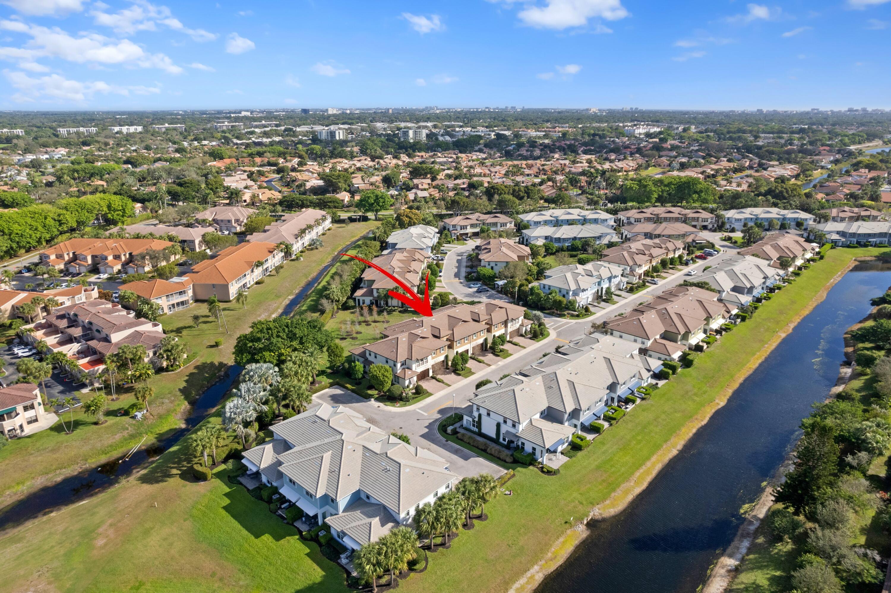 6693 Quiet Wave Trail, Unit 41 Boca Raton, FL 33433 - Photo 27 of 40 an aerial view of residential houses with outdoor space