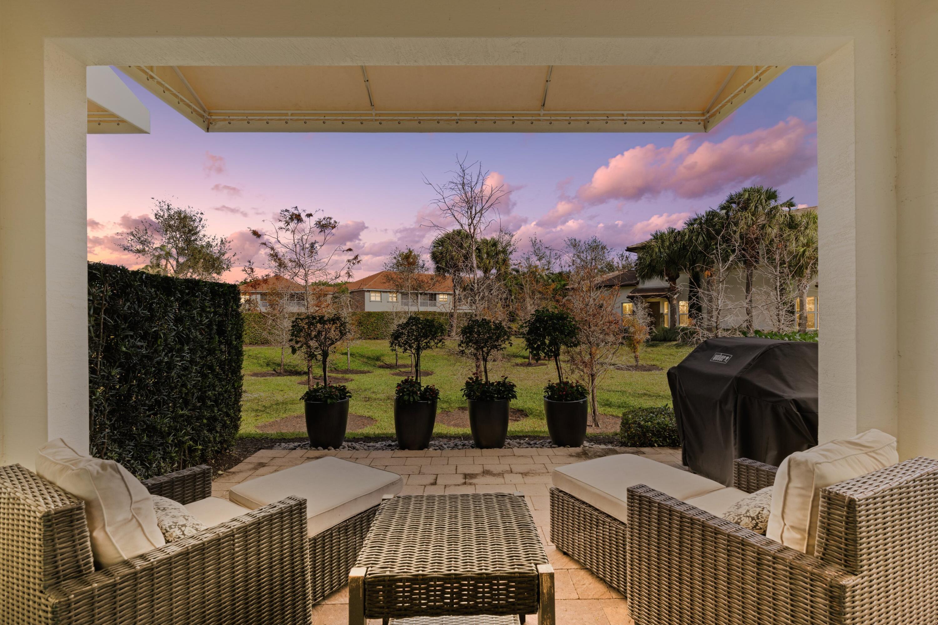 6693 Quiet Wave Trail, Unit 41 Boca Raton, FL 33433 - Photo 3 of 40 a bedroom with a bed and a fireplace
