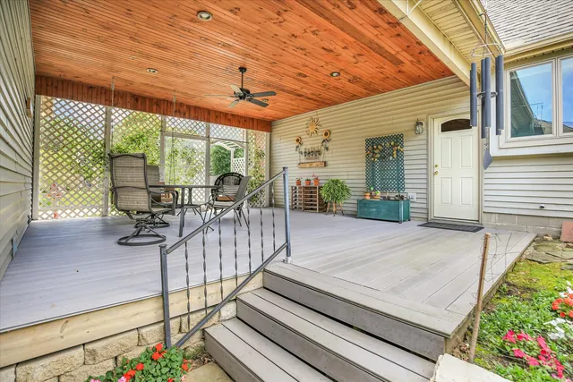 a view of a balcony with wooden floor