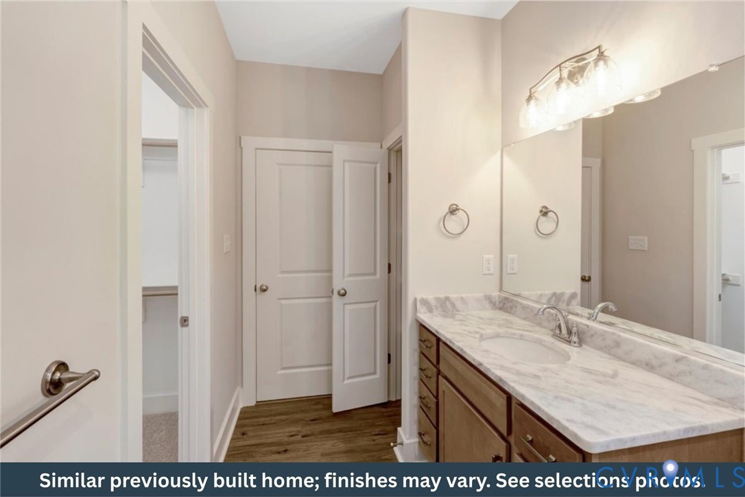 126 Firetower Lane Keysville, VA 23947 - Photo 10 of 18 a bathroom with a sink a vanity and a mirror