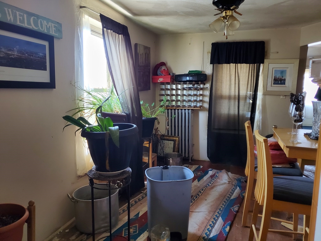 10-12 Carnes Street Lynn, MA 01905 - Photo 8 of 21 a dining room with furniture and window
