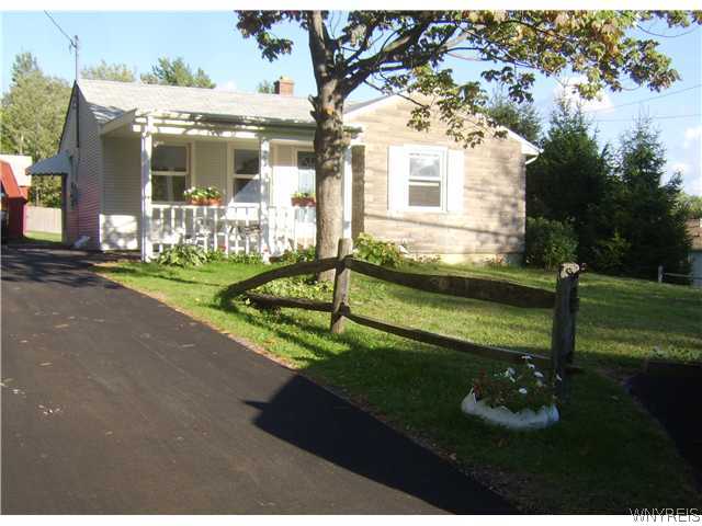 7401 Chestnut Ridge Road Orchard Park, NY 14127 - Photo 1 of 1 Exterior Front. Cozy ranch with new driveway.
