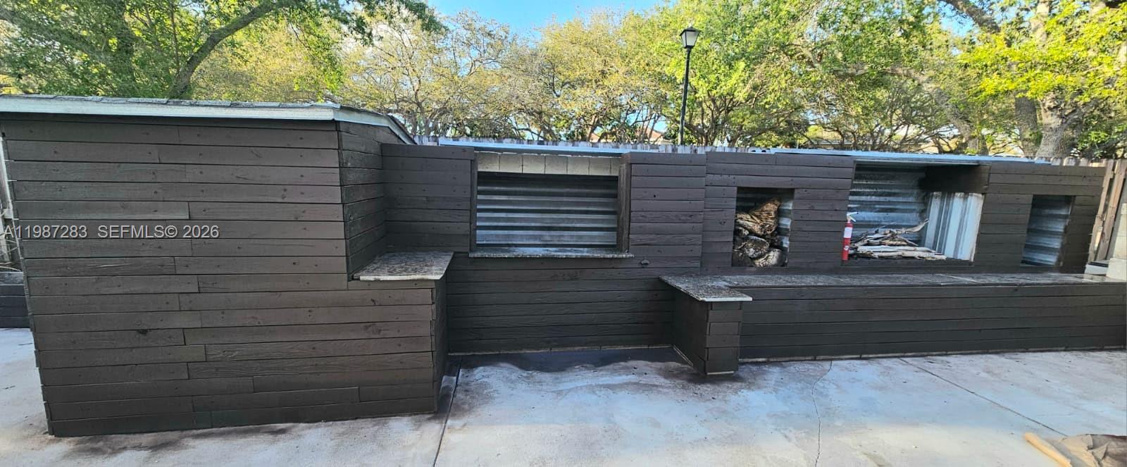 8003 Southwest 158th Place Miami, FL 33193 - Photo 15 of 20 a view of house with outdoor space
