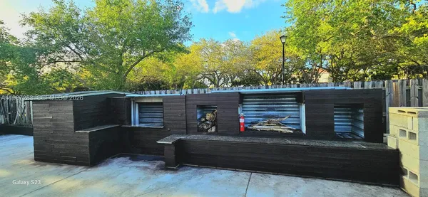 a view of a back yard of the house