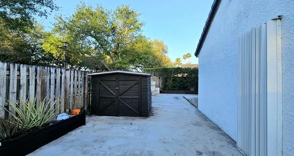 a view of a wooden fence