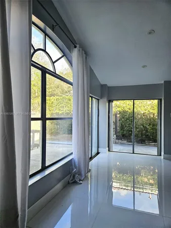 a living room with a large window