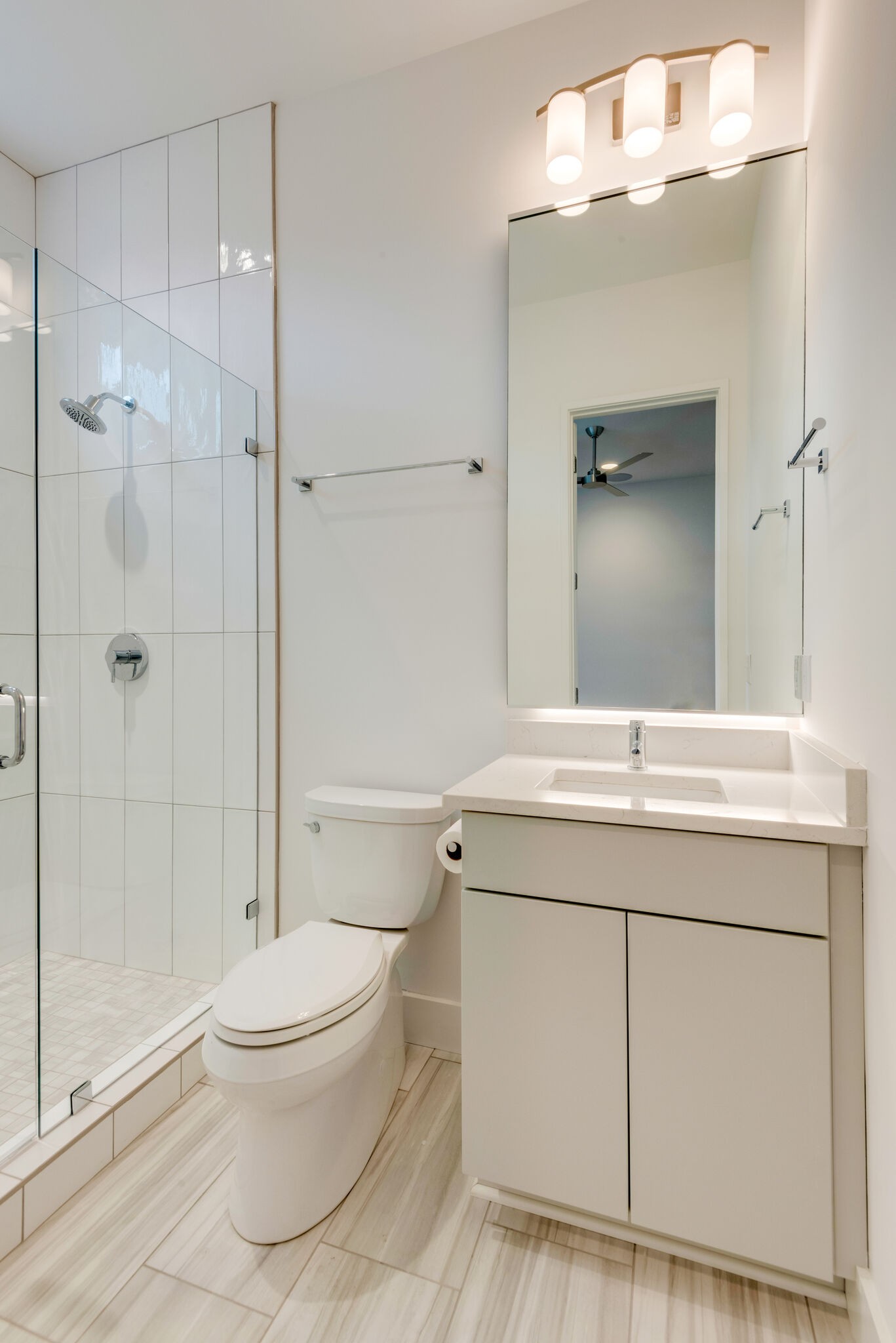 1022 B 9th Avenue South Nashville, TN 37203 - Photo 16 of 38 a bathroom with a sink a toilet and shower