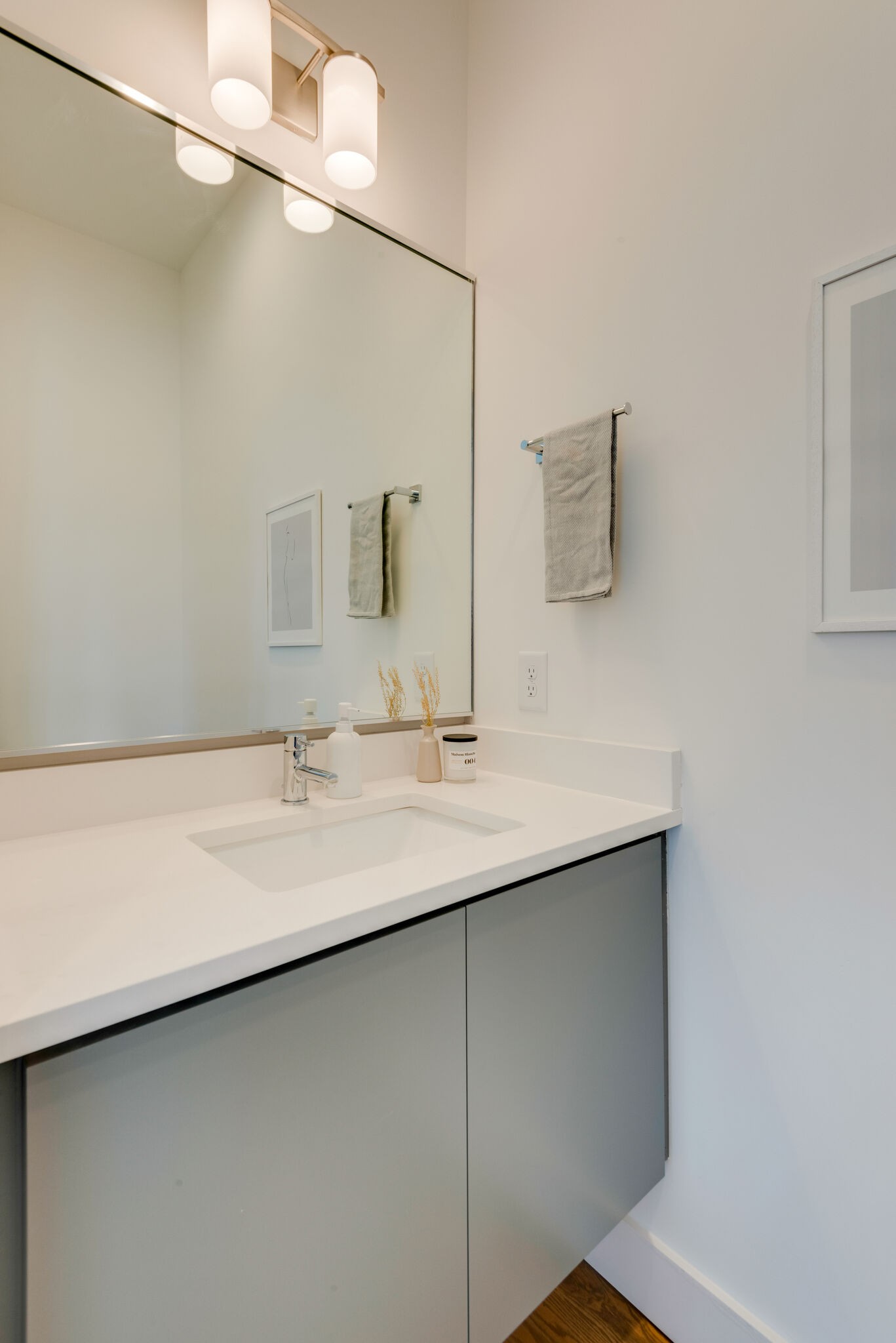 1022 B 9th Avenue South Nashville, TN 37203 - Photo 19 of 38 a bathroom with a sink and a mirror