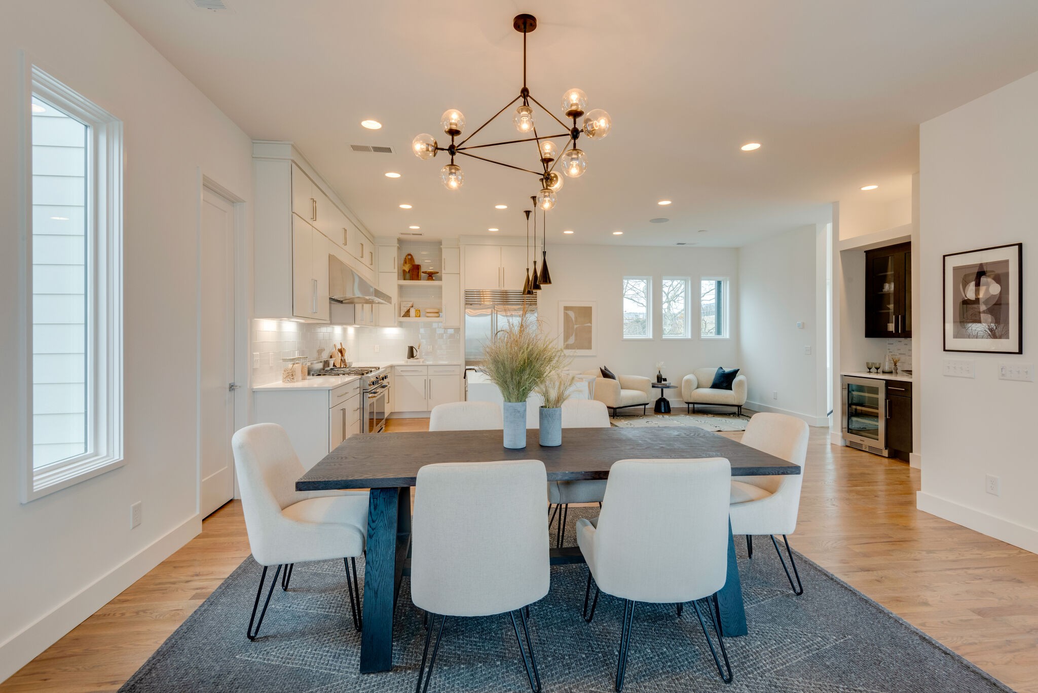 1022 B 9th Avenue South Nashville, TN 37203 - Photo 28 of 38 a view of a dining room with furniture and wooden floor
