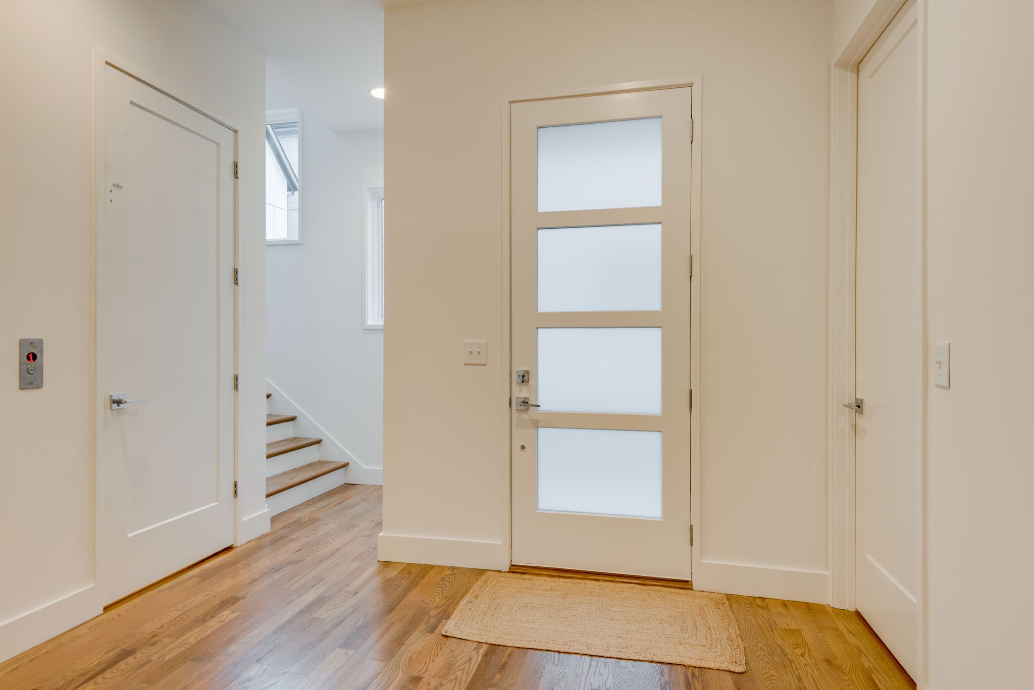 1022 B 9th Avenue South Nashville, TN 37203 - Photo 10 of 38 a view of a hallway with wooden floor and entryway