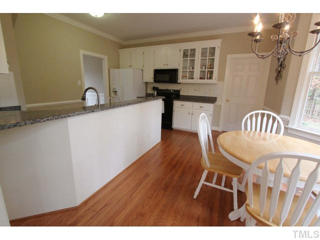 2708 Dahlgreen Road Raleigh, NC 27615 - Photo 4 of 25 a living room with furniture and a flat screen tv