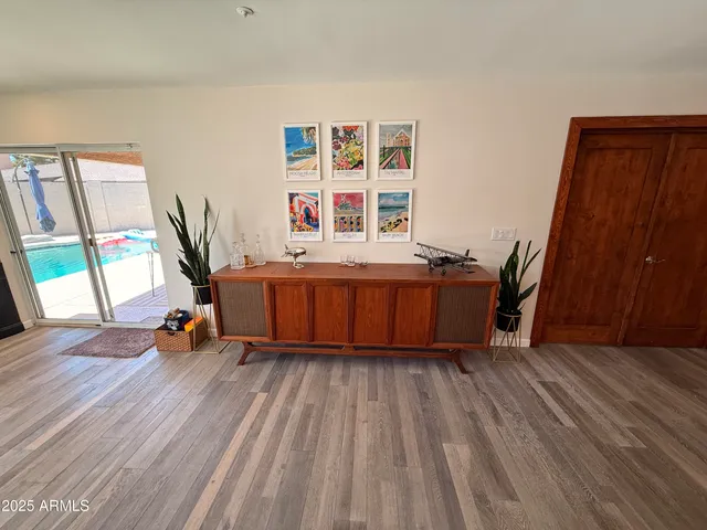 a room with furniture and a wooden floor