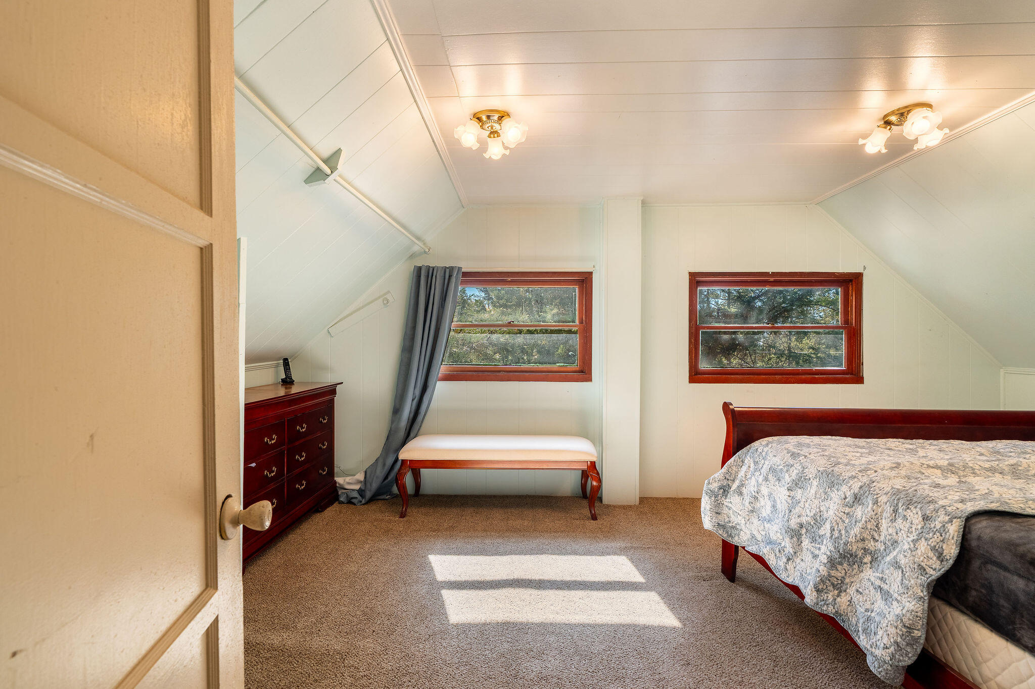 25290 Lodge Road Idyllwild, CA 92549 - Photo 23 of 46 a bedroom with a bed and a window