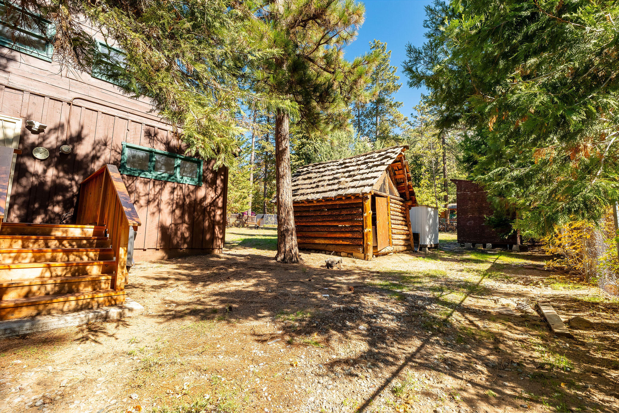 25290 Lodge Road Idyllwild, CA 92549 - Photo 27 of 46 a view of a house with a yard covered in snow