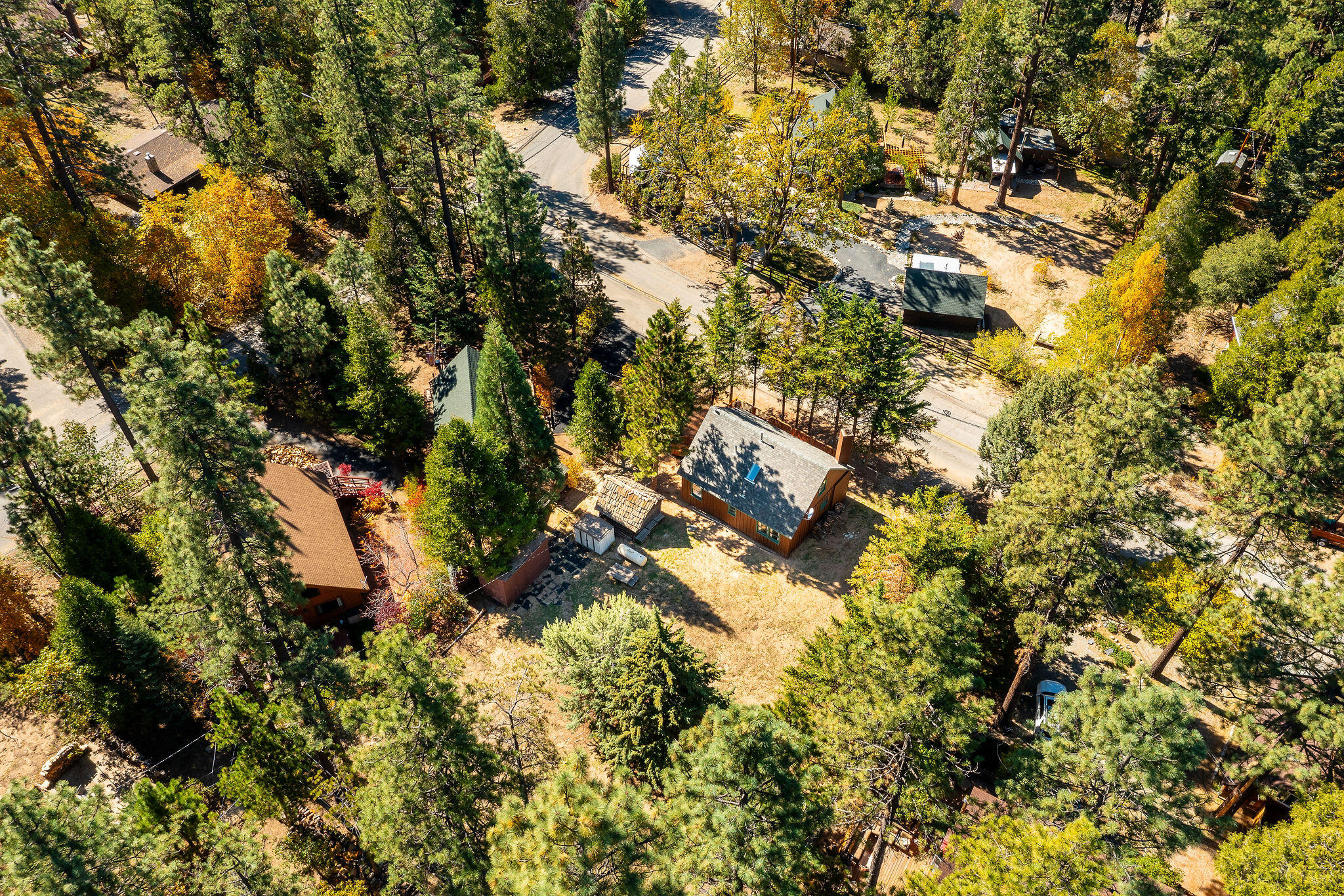 25290 Lodge Road Idyllwild, CA 92549 - Photo 43 of 46 a aerial view of residential house with swimming pool and lawn chairs