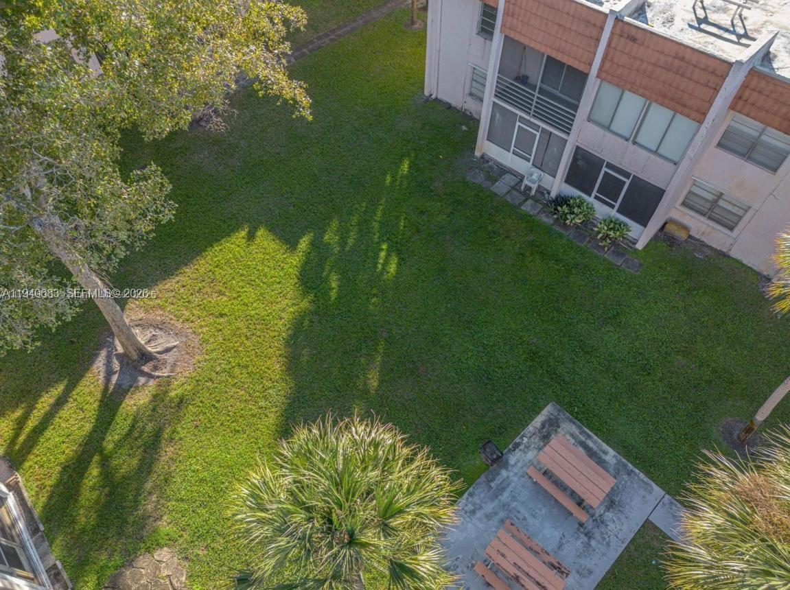 7610 Stirling Road, Unit 207F Davie, FL 33024 - Photo 15 of 22 a aerial view of residential houses with outdoor space and trees