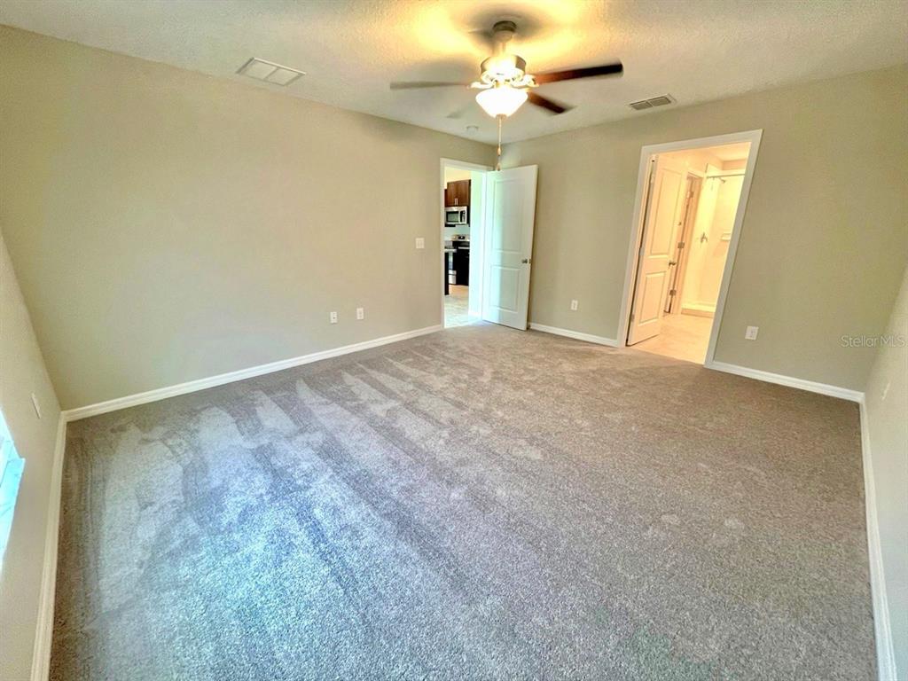 869 Anchor Bend Drive Ruskin, FL 33570 - Photo 16 of 23 a view of an empty room with a window