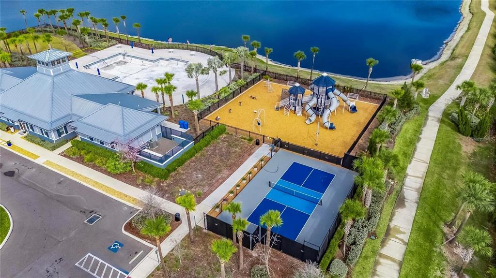 869 Anchor Bend Drive Ruskin, FL 33570 - Photo 23 of 23 aerial view of a house with a swimming pool