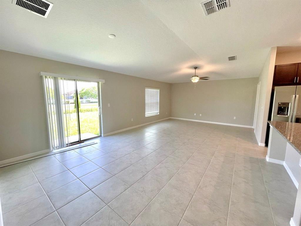 869 Anchor Bend Drive Ruskin, FL 33570 - Photo 6 of 23 a view of a livingroom with a staircase
