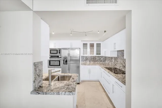 a workspace with furniture and painting on the wall