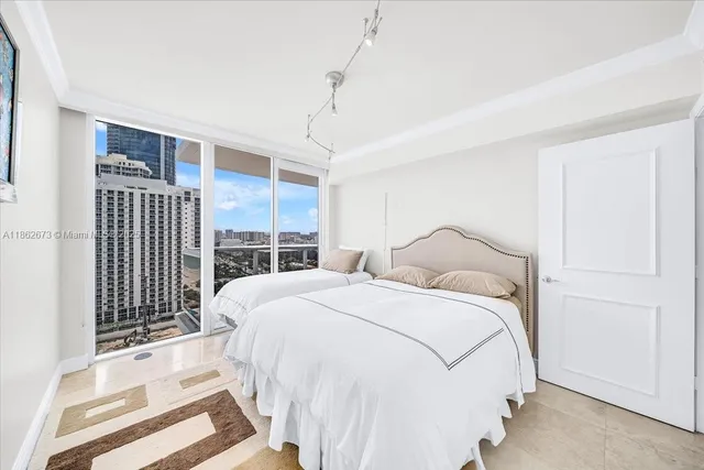 a view of a city with tall buildings