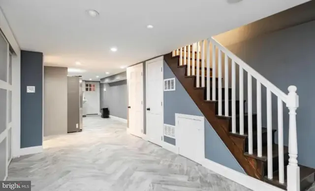 a view of a hallway with staircase