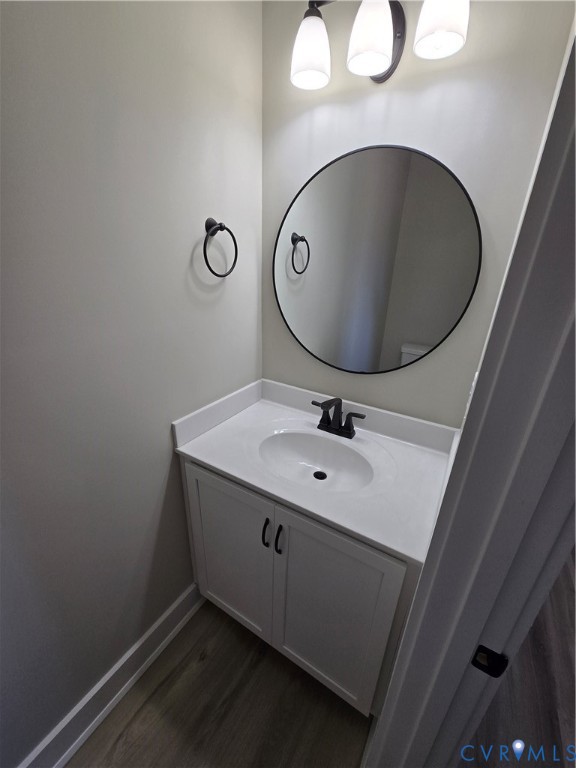 1781 Bumpass Road Bumpass, VA 23024 - Photo 24 of 26 a bathroom with a sink and mirror