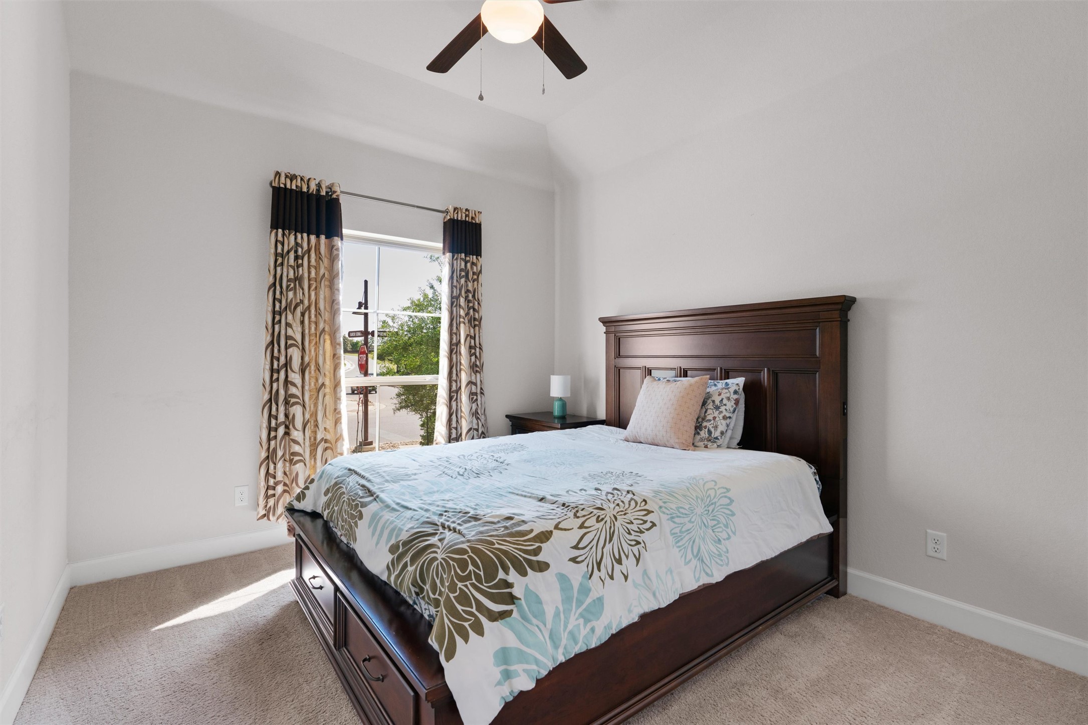 101 Pienza Drive Georgetown, TX 78628 - Photo 25 of 40 a bedroom with a bed and large window