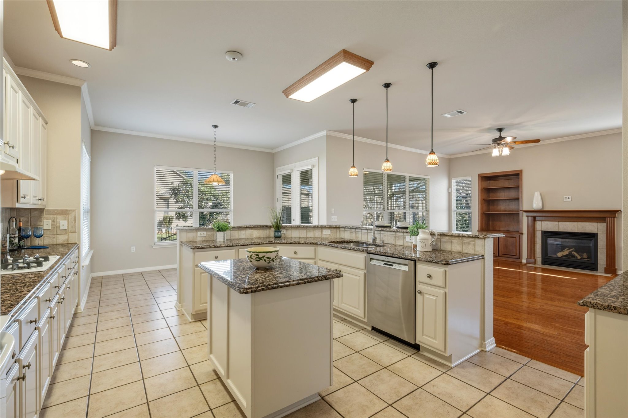 114 Whippoorwill Way Georgetown, TX 78633 - Photo 13 of 37 a kitchen with stainless steel appliances granite countertop a stove a sink a oven and a refrigerator