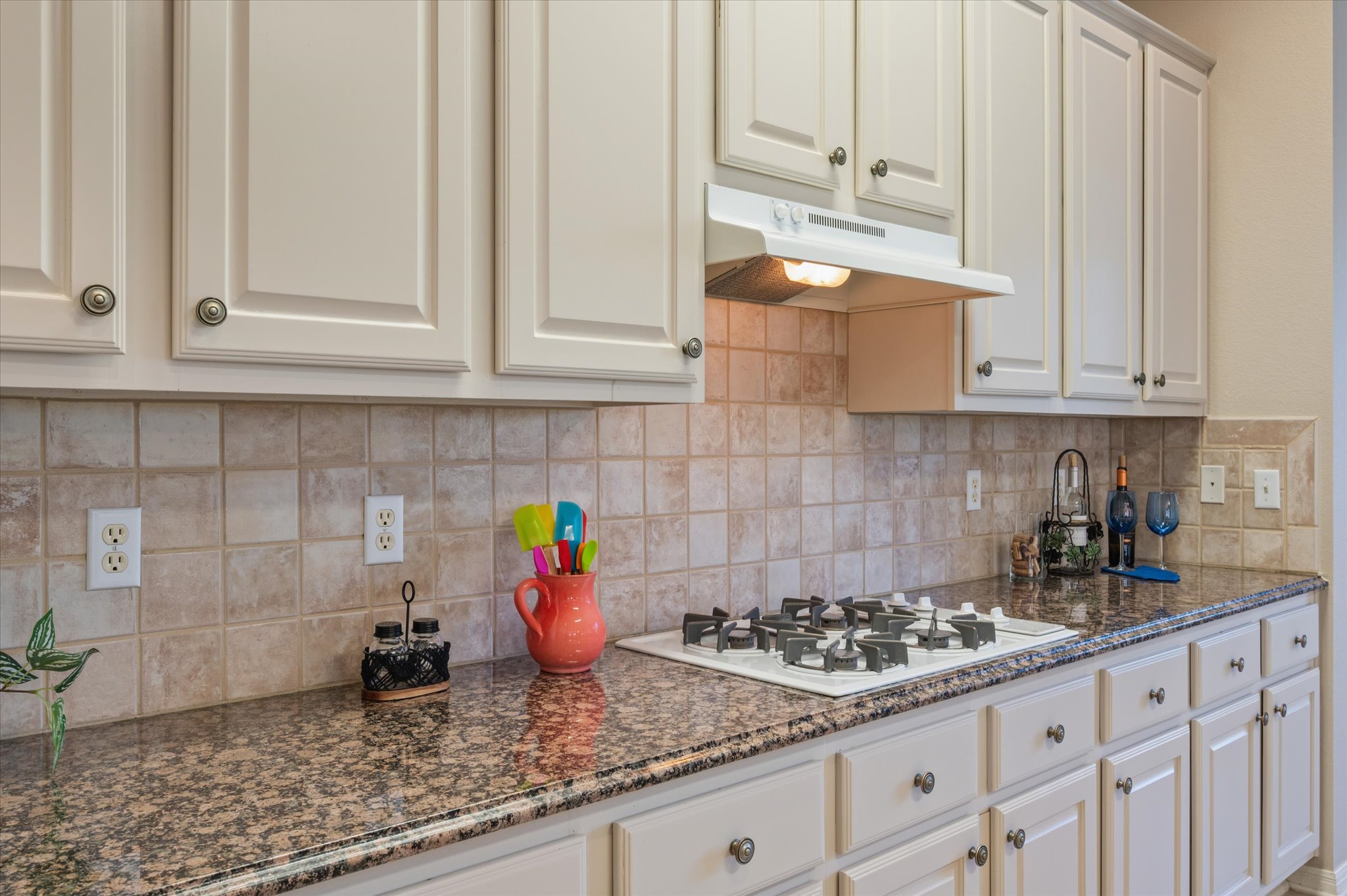 114 Whippoorwill Way Georgetown, TX 78633 - Photo 16 of 37 a kitchen with stainless steel appliances granite countertop a sink stove and cabinets
