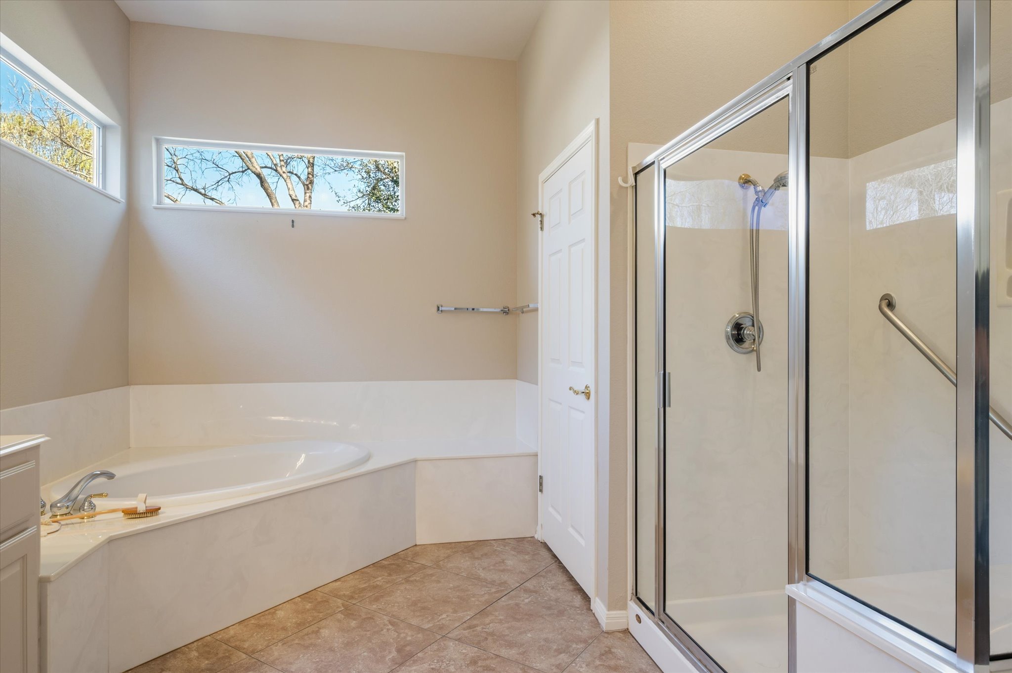 114 Whippoorwill Way Georgetown, TX 78633 - Photo 23 of 37 a bathroom with a bathtub and a shower