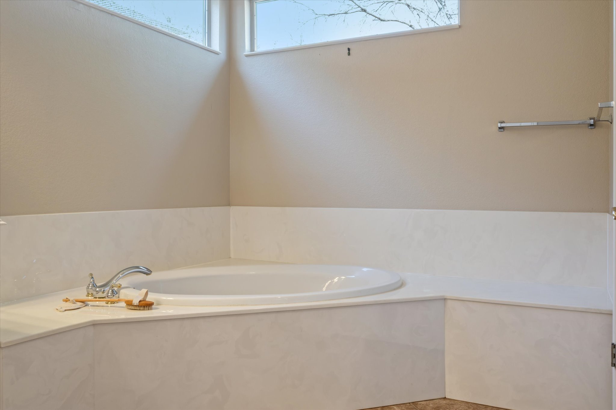 114 Whippoorwill Way Georgetown, TX 78633 - Photo 24 of 37 a bathroom with a white bath tub and a sink