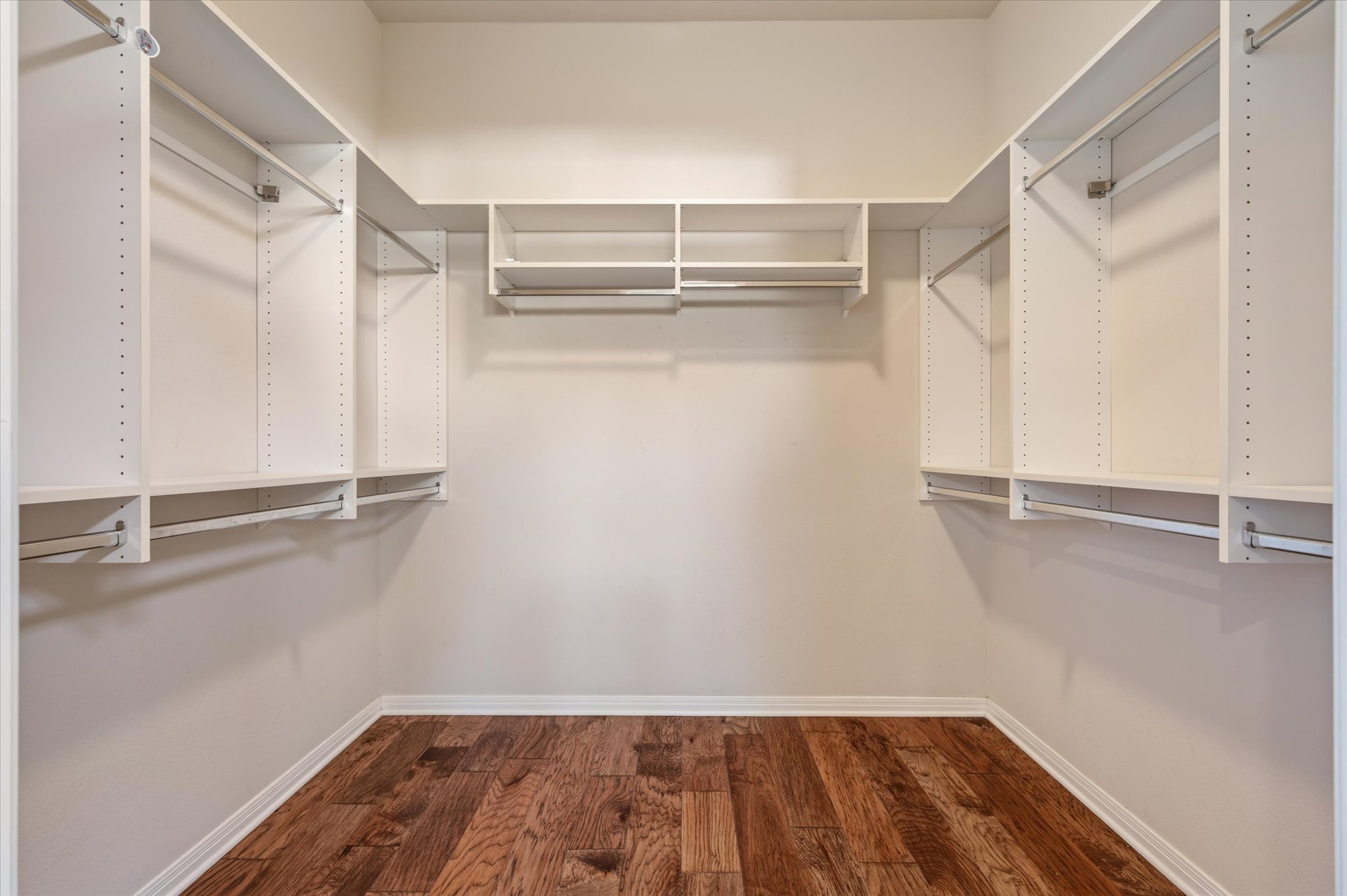 114 Whippoorwill Way Georgetown, TX 78633 - Photo 26 of 37 a view of walk in closet with empty racks