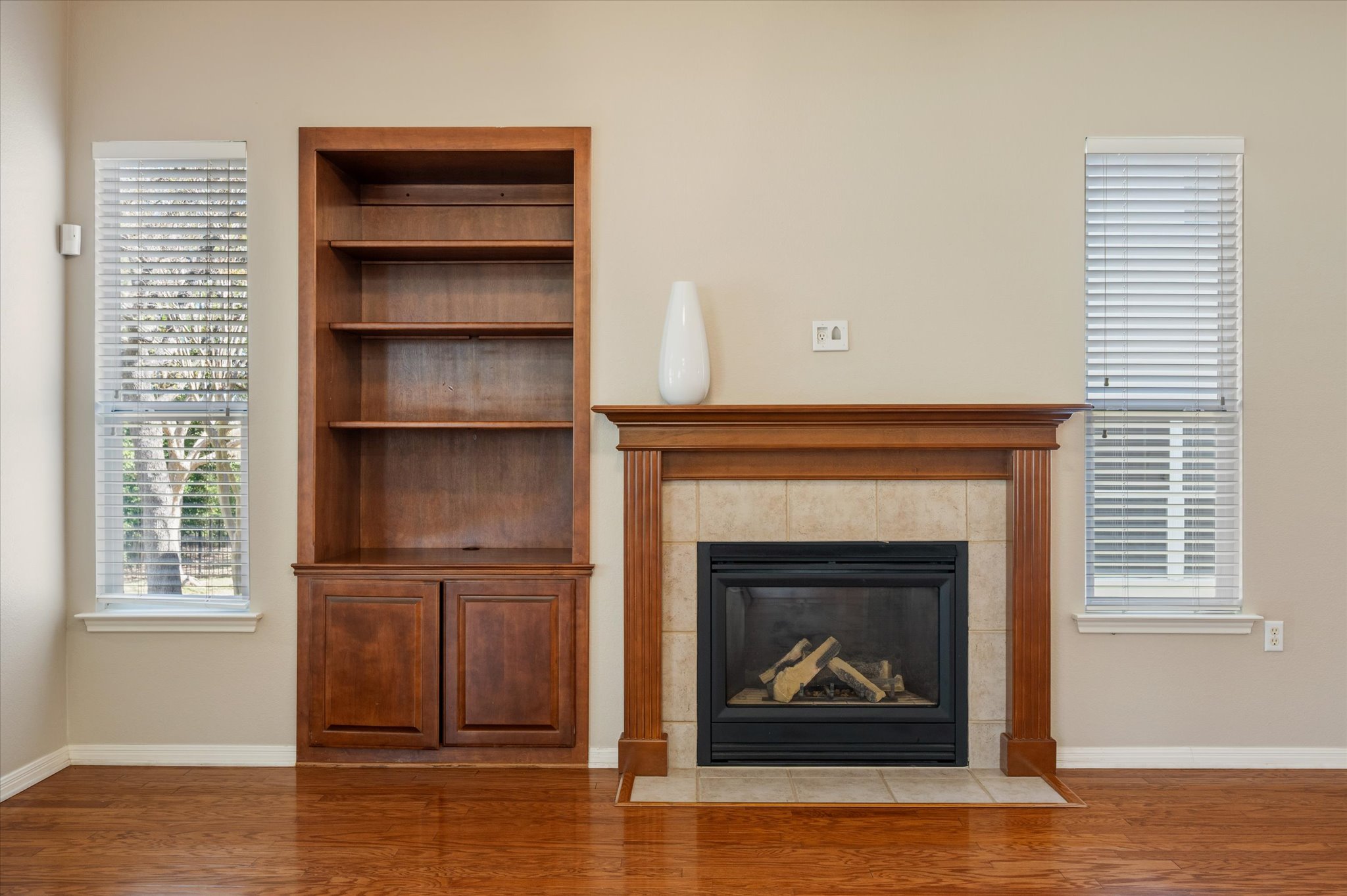 114 Whippoorwill Way Georgetown, TX 78633 - Photo 30 of 37 a living room with a fireplace