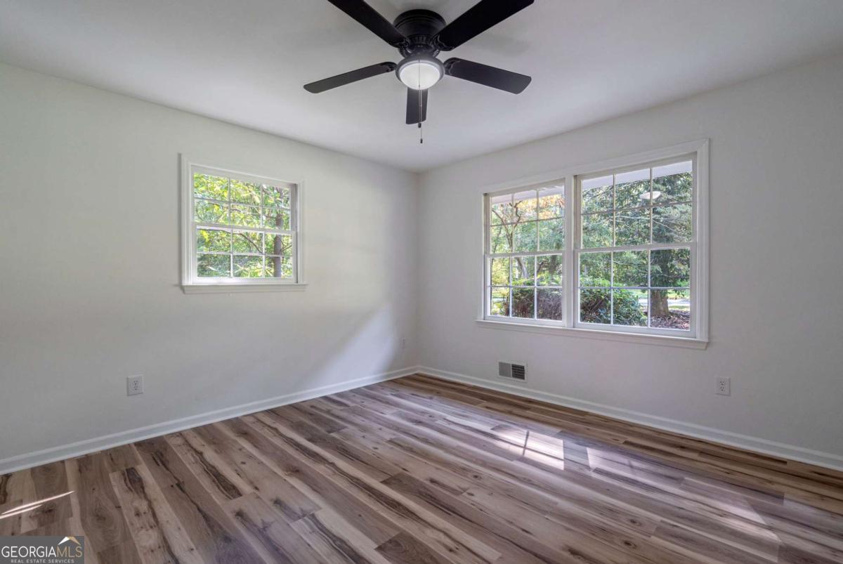 400 Sandstone Drive Athens, GA 30605 - Photo 18 of 41 a view of wooden floor and windows in a room