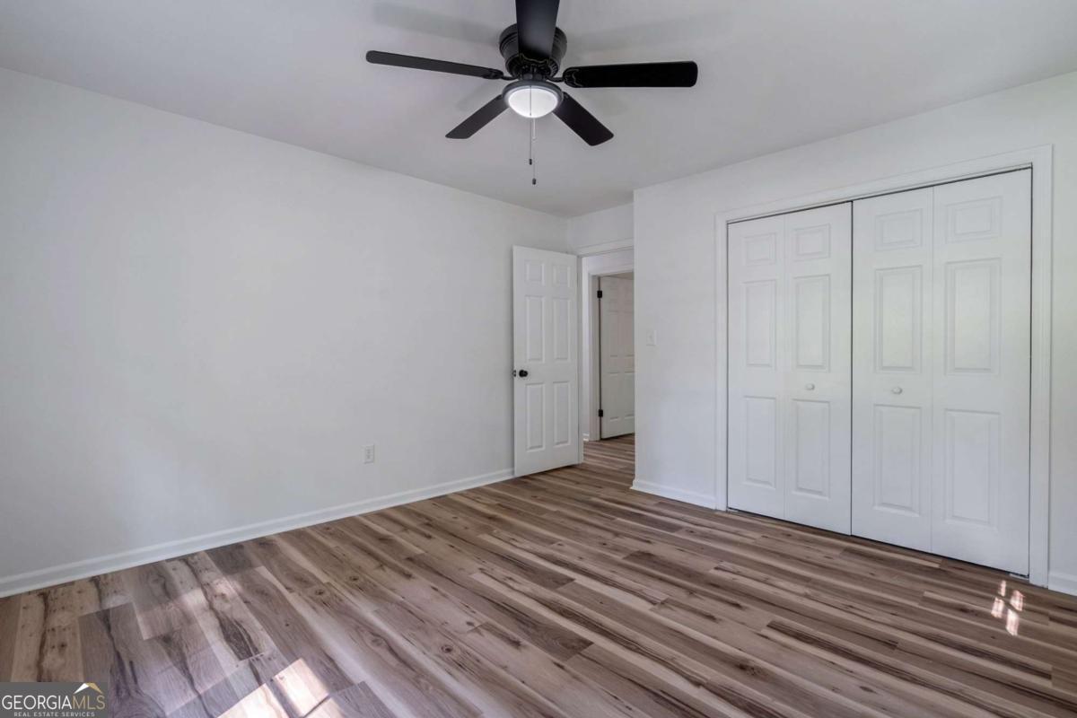 400 Sandstone Drive Athens, GA 30605 - Photo 20 of 41 a view of empty room with wooden floor