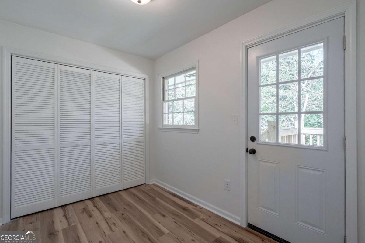 400 Sandstone Drive Athens, GA 30605 - Photo 22 of 41 an empty room with windows
