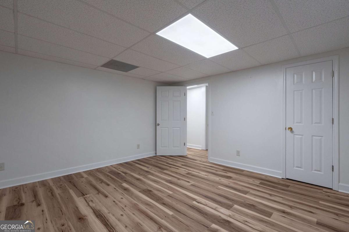 400 Sandstone Drive Athens, GA 30605 - Photo 25 of 41 a view of room with wooden floor