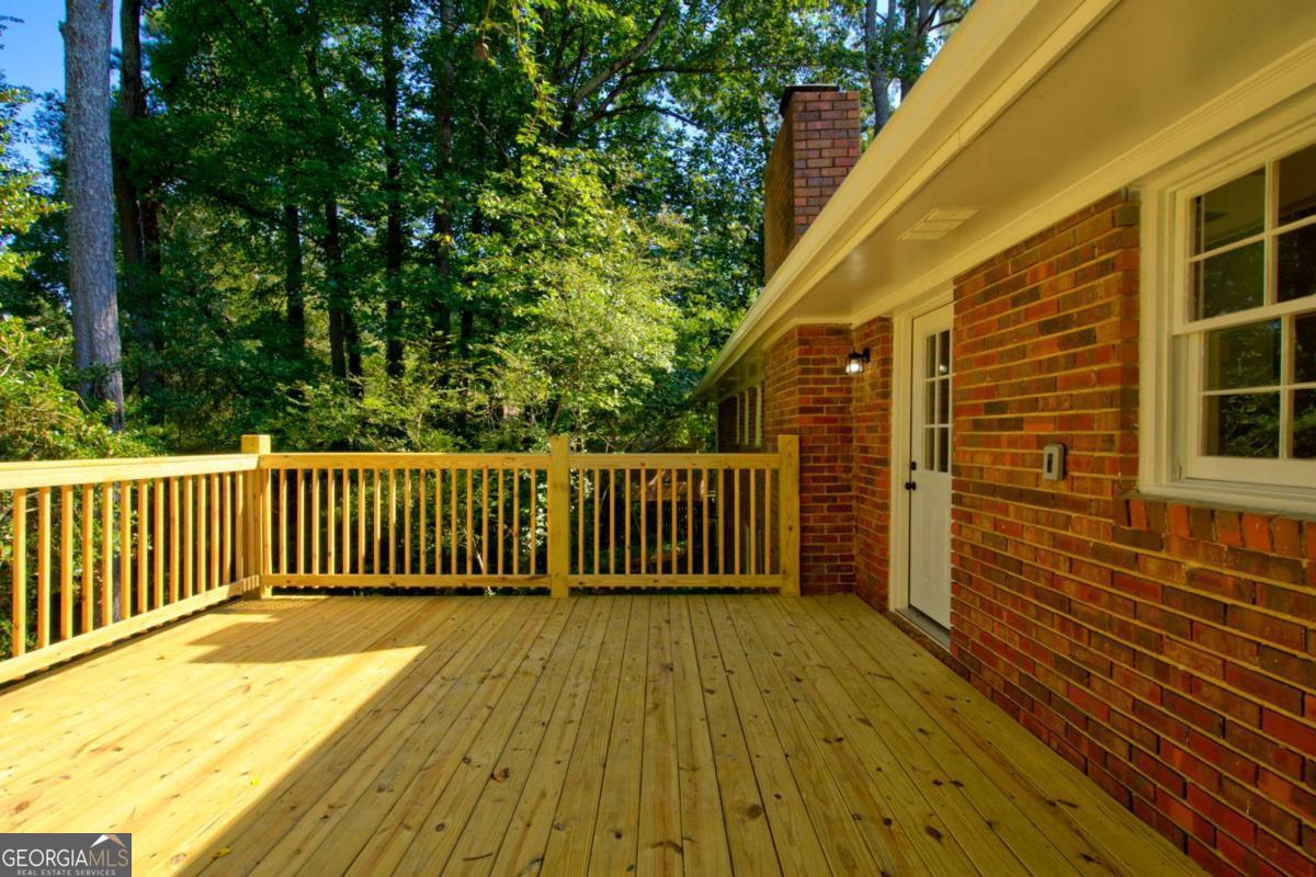 400 Sandstone Drive Athens, GA 30605 - Photo 40 of 41 a view of deck with wooden floor and fence