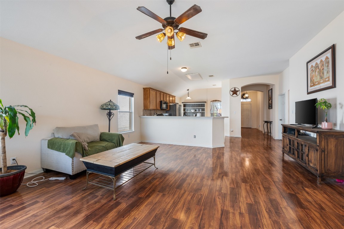 221 Stone Crest Boulevard Buda, TX 78610 - Photo 15 of 33 a living room with furniture and a wooden floor