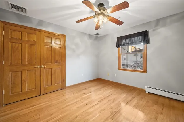 a kitchen with a refrigerator a stove a sink and a microwave