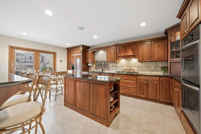 a kitchen with lots of counter top space and living room