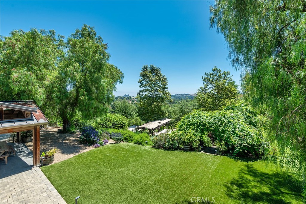 5207 Saddle Creek Road Hidden Hills, CA 91302 - Photo 28 of 54 a view of backyard with seating area