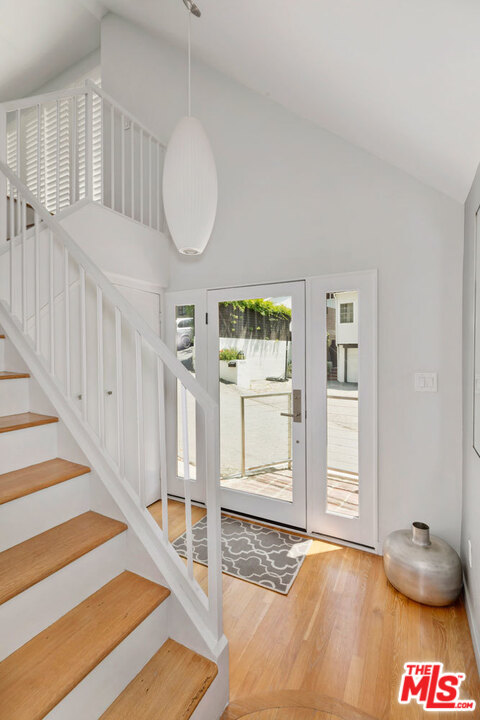 9831 Easton Drive Beverly Hills, CA 90210 - Photo 3 of 27 a view of entryway and hall with wooden floor