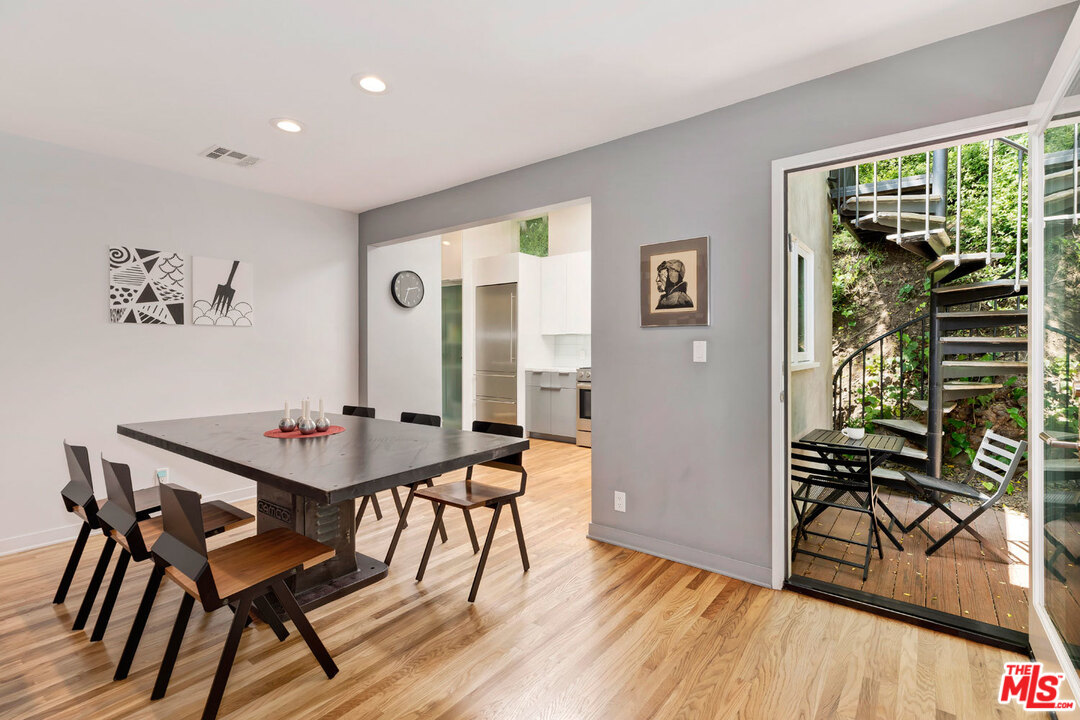 9831 Easton Drive Beverly Hills, CA 90210 - Photo 7 of 27 a view of a livingroom and dining room