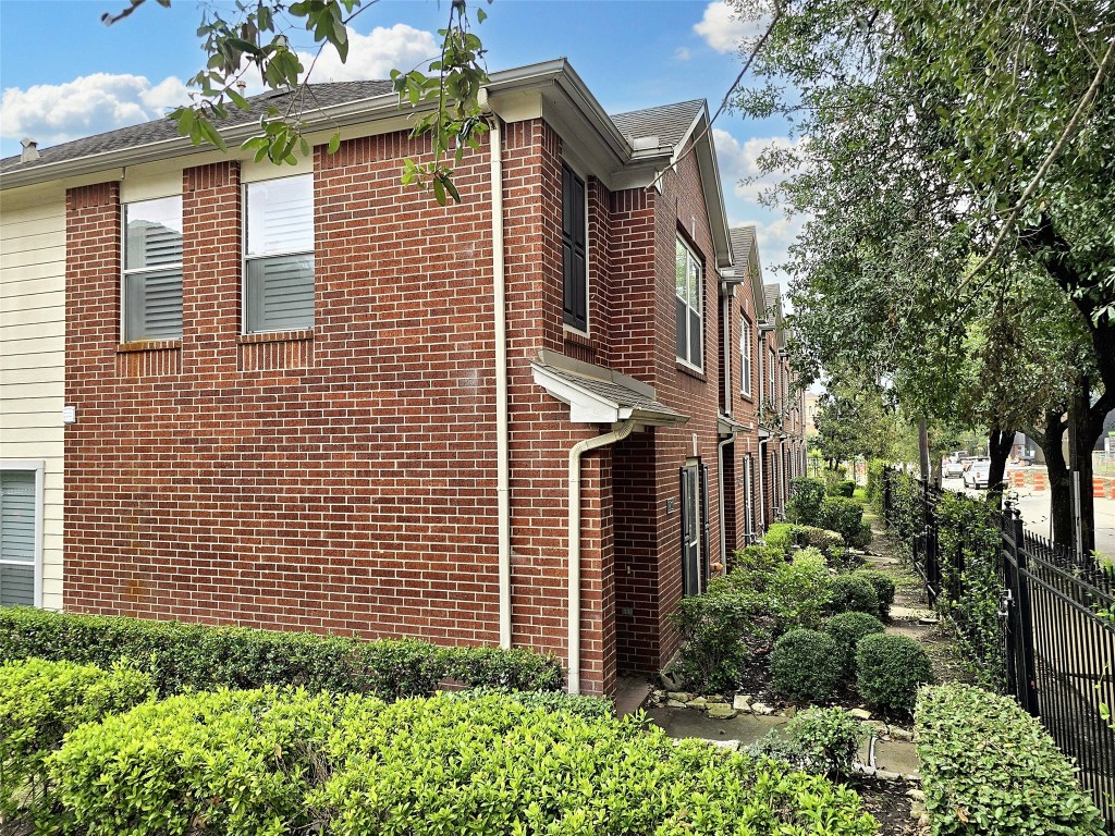 2211 Runnels Street Houston, TX 77003 - Photo 2 of 17 a view of a house with a yard and plants