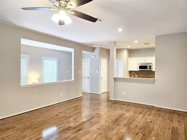 a view of a kitchen and a window