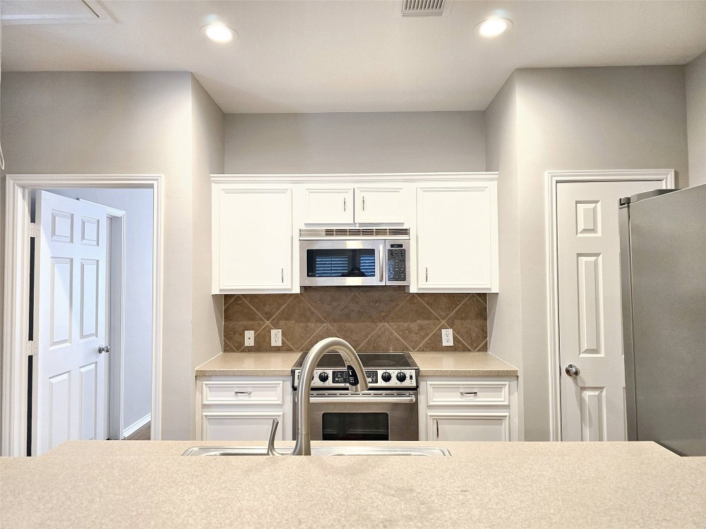 2211 Runnels Street Houston, TX 77003 - Photo 8 of 17 a view of kitchen and refrigerator